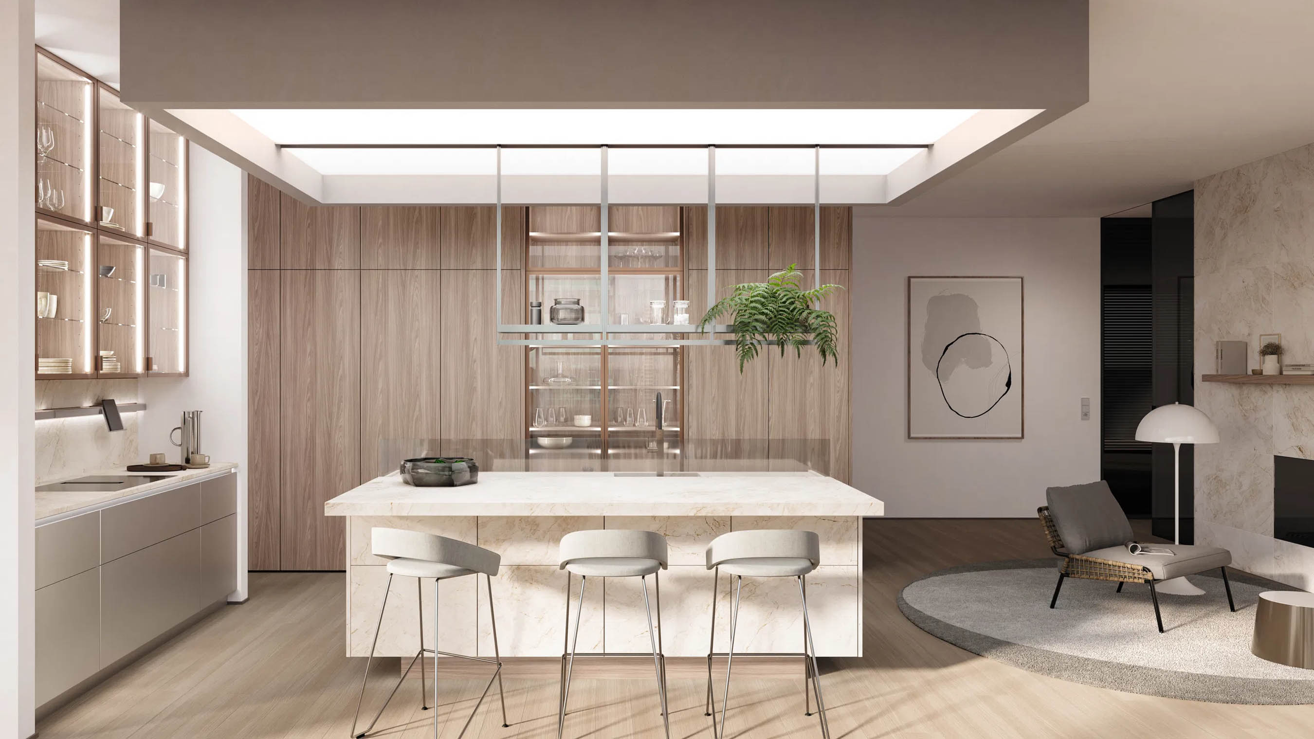 Cuisine moderne et lumineuse avec îlot central en marbre clair, mobilier en bois clair, étagères vitrées éclairées, et chaise longue dans l'espace salon.